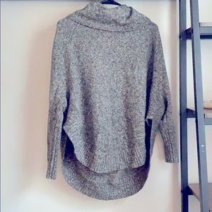 Cowl neck sweater with side cuts